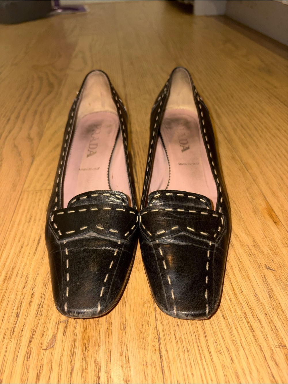 Prada Black Leather Loafers with Contrast White Stitching
